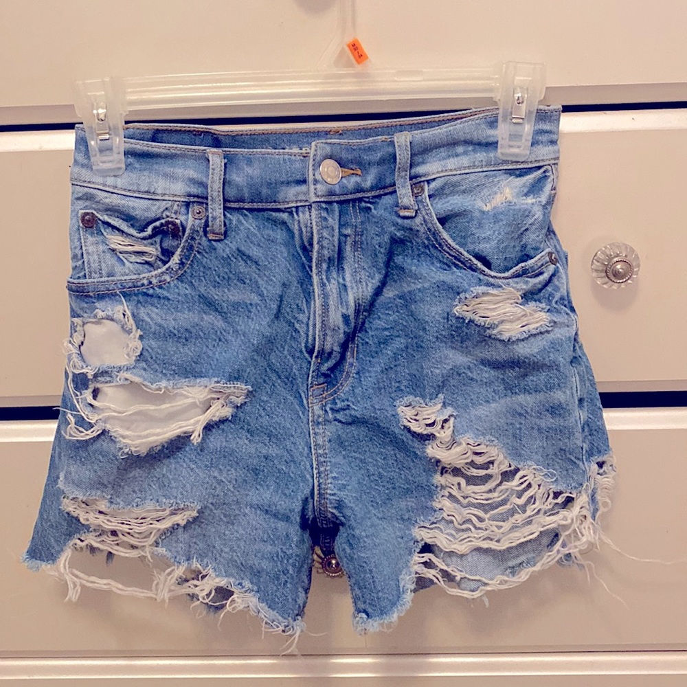 American eagle shorts,medium blue with rips,size 00